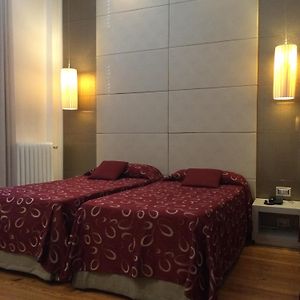 Kamer met een Queen Size Bed